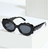 black scalloped women sunglasses, wavy frame, affordable french fashion, fun accessories