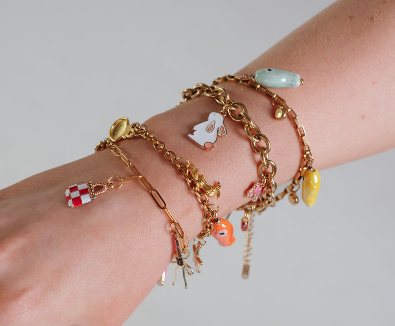 affordable custom charm bracelet, gold charm bracelets, cactus charm, seashell charm, french fashion label,  lipstick charm